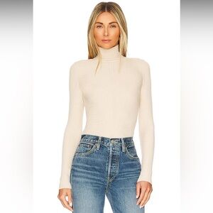 Peyton Turtleneck Sweater in Cream
House of Harlow 1960